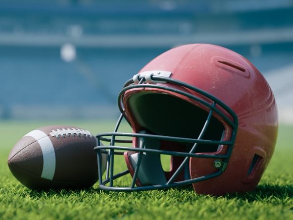 American football ball and helmet